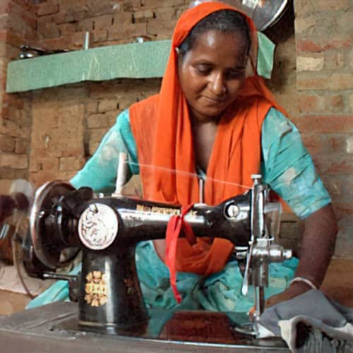 Woman can escape poverty through an income generating gift of a sewing machine