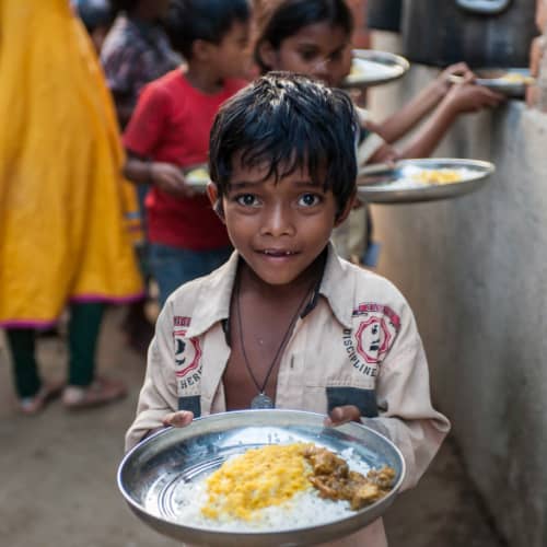 Children like this young boy can escape poverty, and enjoy a nutritious meal everyday through GFA World (Gospel for Asia) child sponsorship program