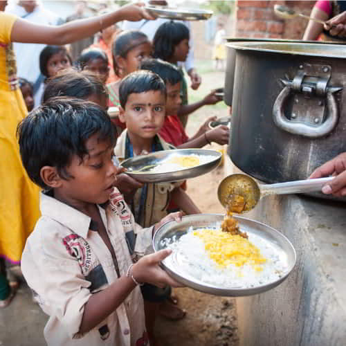 Children enjoy nutritious meals through GFA World (Gospel for Asia) child sponsorship program