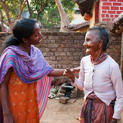 GFA World woman missionary shares the love of Christ to a leprosy patient