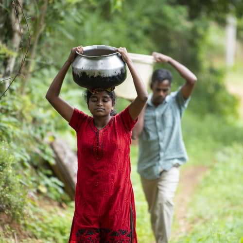 Villagers walk long distances to acquire water due to the lack of clean water initiatives near their area