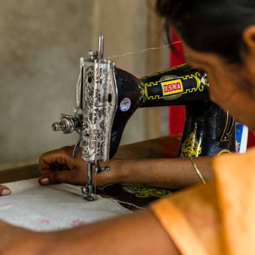 GFA World income generating sewing machines helps how many people are in child labor