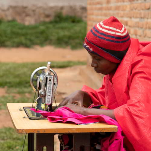GFA World income generating gifts of sewing machines fight the war on poverty