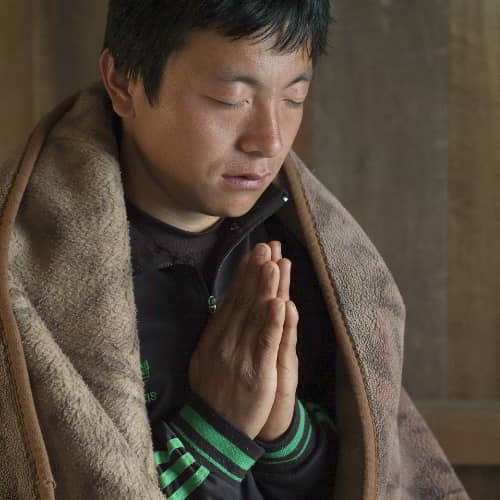 A praying GFA World national missionary