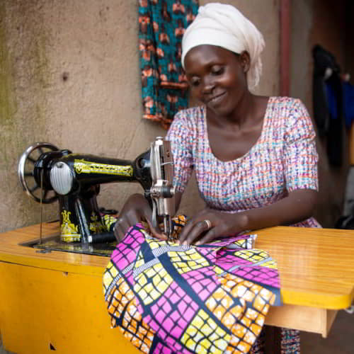 Tailoring skills gained through GFA World vocational training can lift women out of poverty