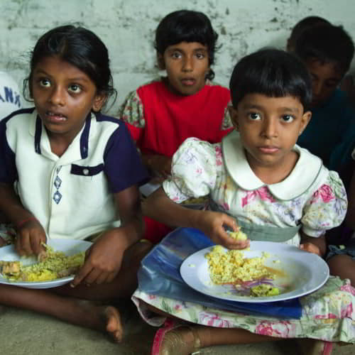 Children are able to eat nutritious food through GFA World child sponsorship program