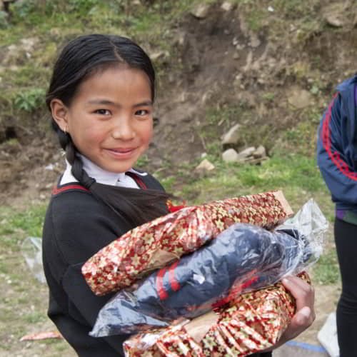 Young girl received school supplies through GFA World child sponsorship