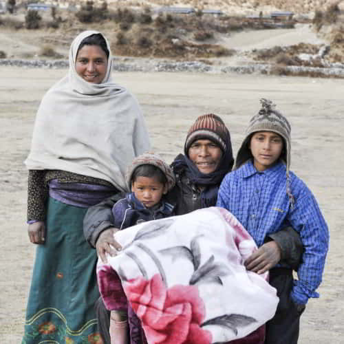 Family received warm clothing from GFA World gift distribution