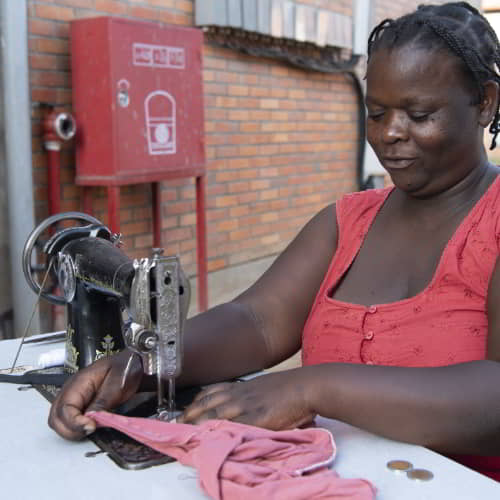 A sewing and tailoring class is one of GFA World's 5 ways to reduce poverty