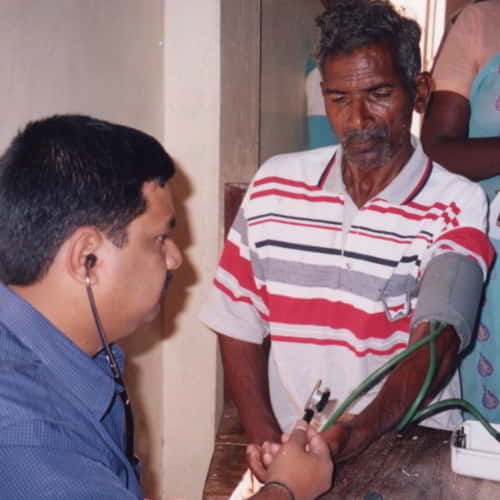 Man in poverty receives a free checkup from GFA World medical camp