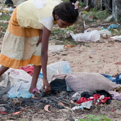 Young girl in poverty living in the slums