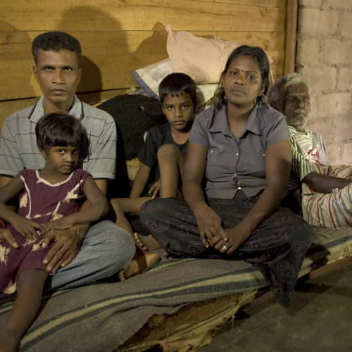 Family in poverty living in the slums of Asia