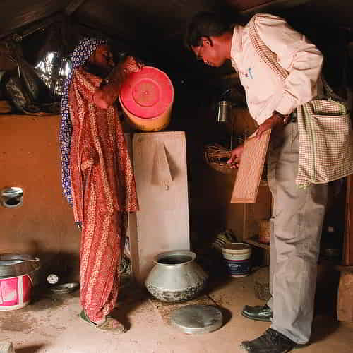 This woman is able to acquire clean water through GFA World BioSand water filters