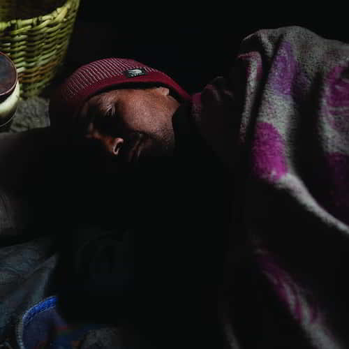 Man in poverty with no health care access in South Asia