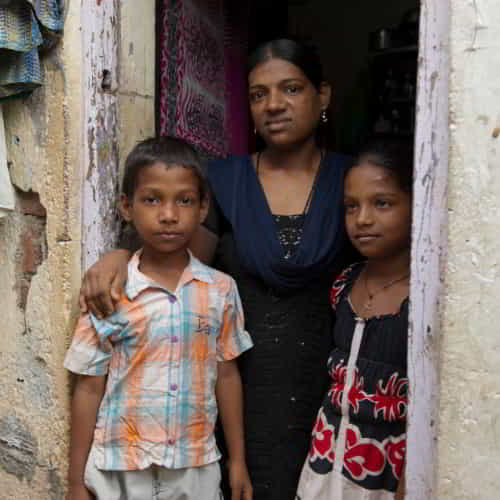 Family in poverty living in the slums of South Asia