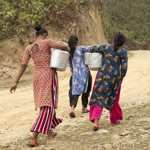 World water crisis facts: Women and girls walk long distances to collect water