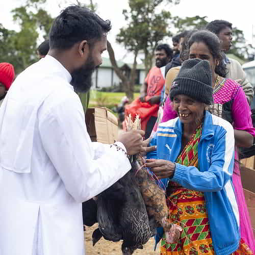 Woman in poverty received gift of chickens through GFA World