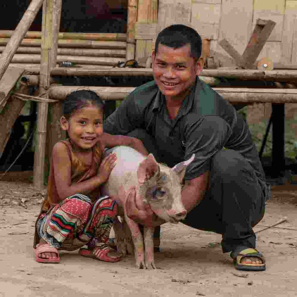 GFA World Christmas gift distribution provided an income generating gift of a pig for this family