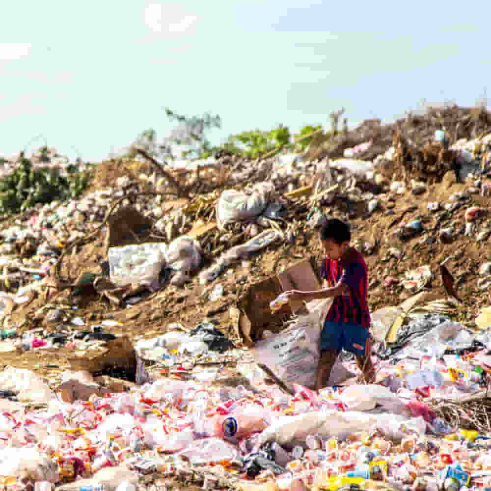 Child labor in a garbage dump site