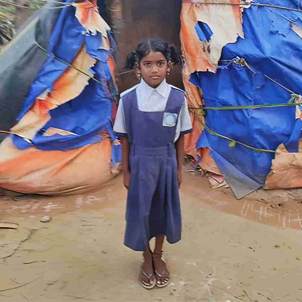 Divena (pictured) and her brother lived alone in this tent while their father spent weeks at a time on the road as a truck driver.
