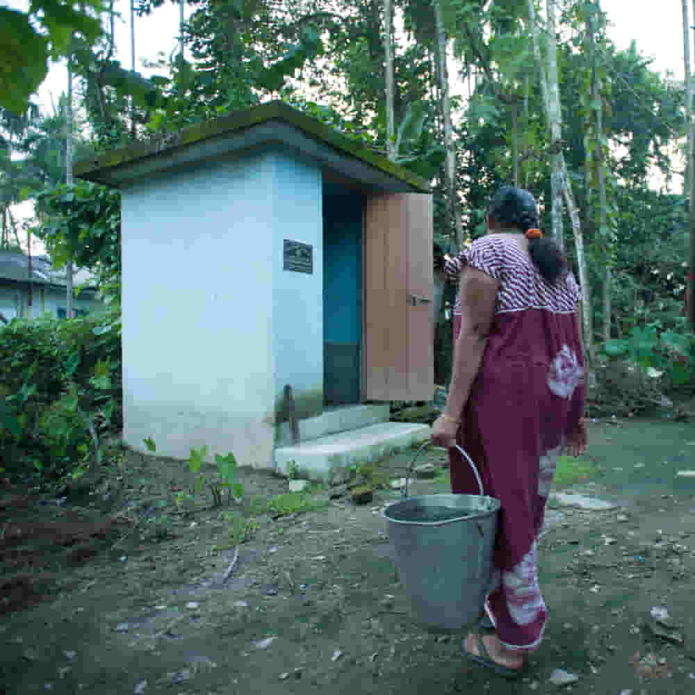 Proper sanitation protects the water sources in this village.