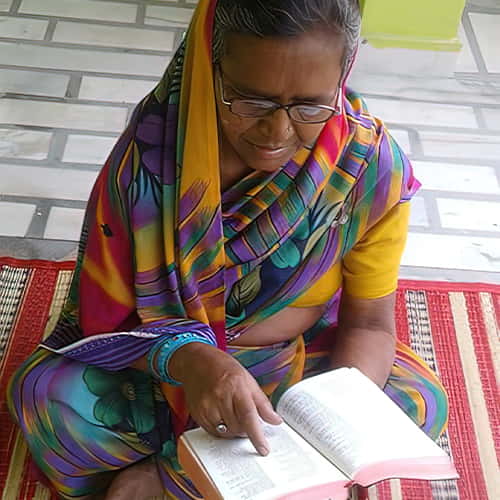 Jeni is now able to read her Bible through GFA World adult literacy class