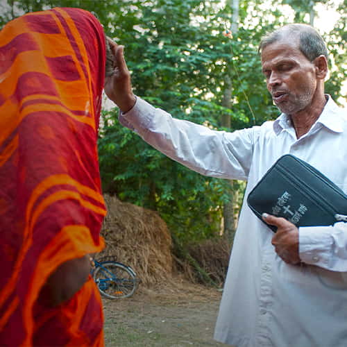 GFA World missionary pastor Dhinanath prays for Athalia