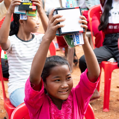 Girls receive school supplies through GFA World child sponsorship program