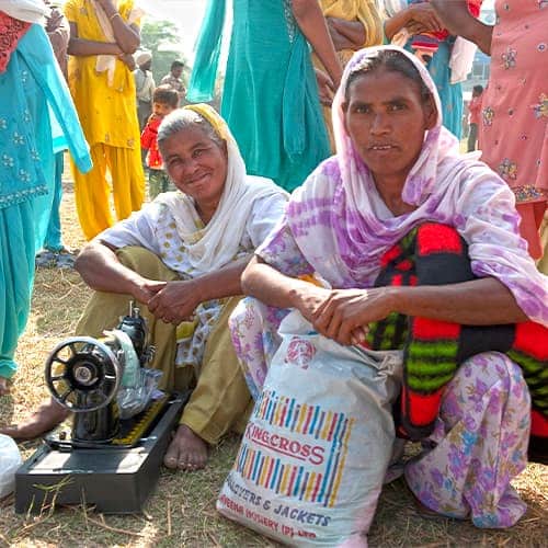 Women can escape poverty through an income generating gift of a sewing machine from GFA World gift distribution