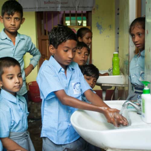 GFA World child sponsorship program helps address hygiene poverty through hygiene and sanitation training like hand washing