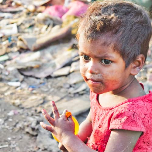 Young girl in poverty living in the slums