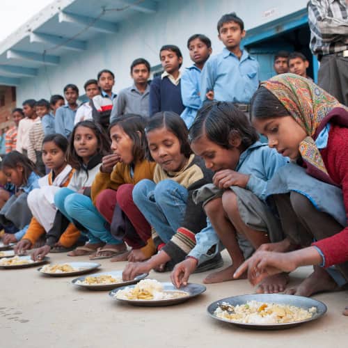 Children enjoy a nutritious meal in GFA World (Gospel for Asia) child sponsorship program