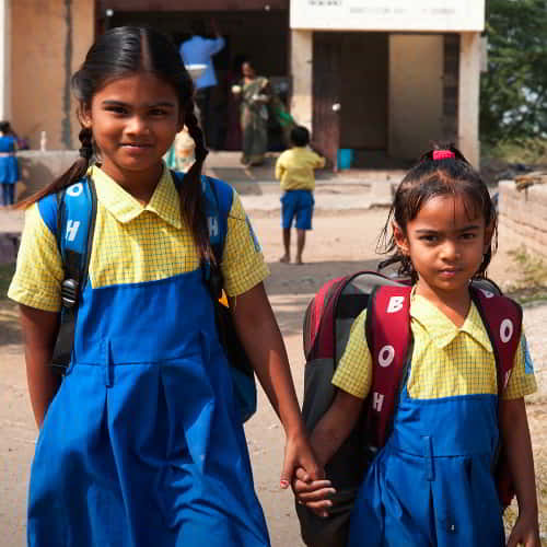 Girls walking home from GFA World (Gospel for Asia) Child Sponsorship Program
