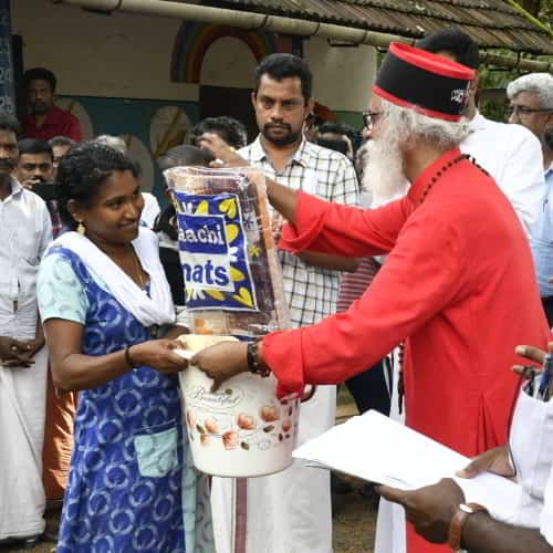 GFA World founder, KP Yohannan, and teams of relief workers distributing supplies and conducting free medical camps in South Asia