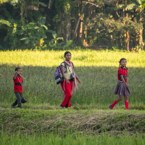 Children walking long distances to go to school