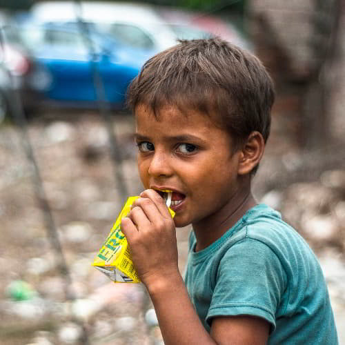 Boy in poverty in the slums of South Asia