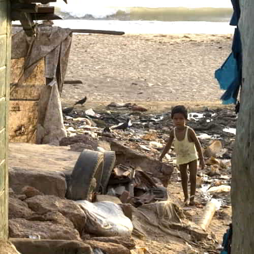 Child in poverty with compromised health living in the slums of South Asia