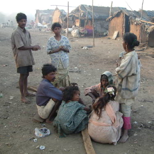 Family in poverty in a slum in South Asia