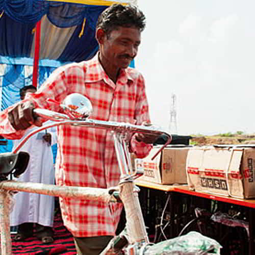 Rajbir received an income generating gift of a bicycle through GFA World