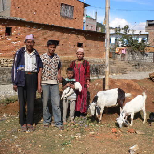 Family receives an income generating gift of a goat through GFA World gift distribution