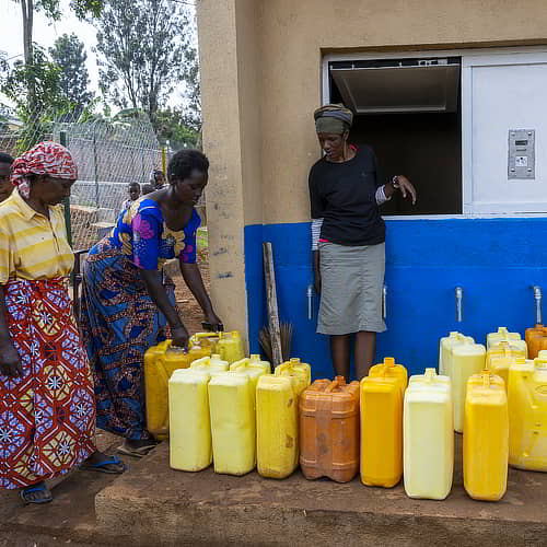 Women collecting clean water through GFA World Jesus Wells